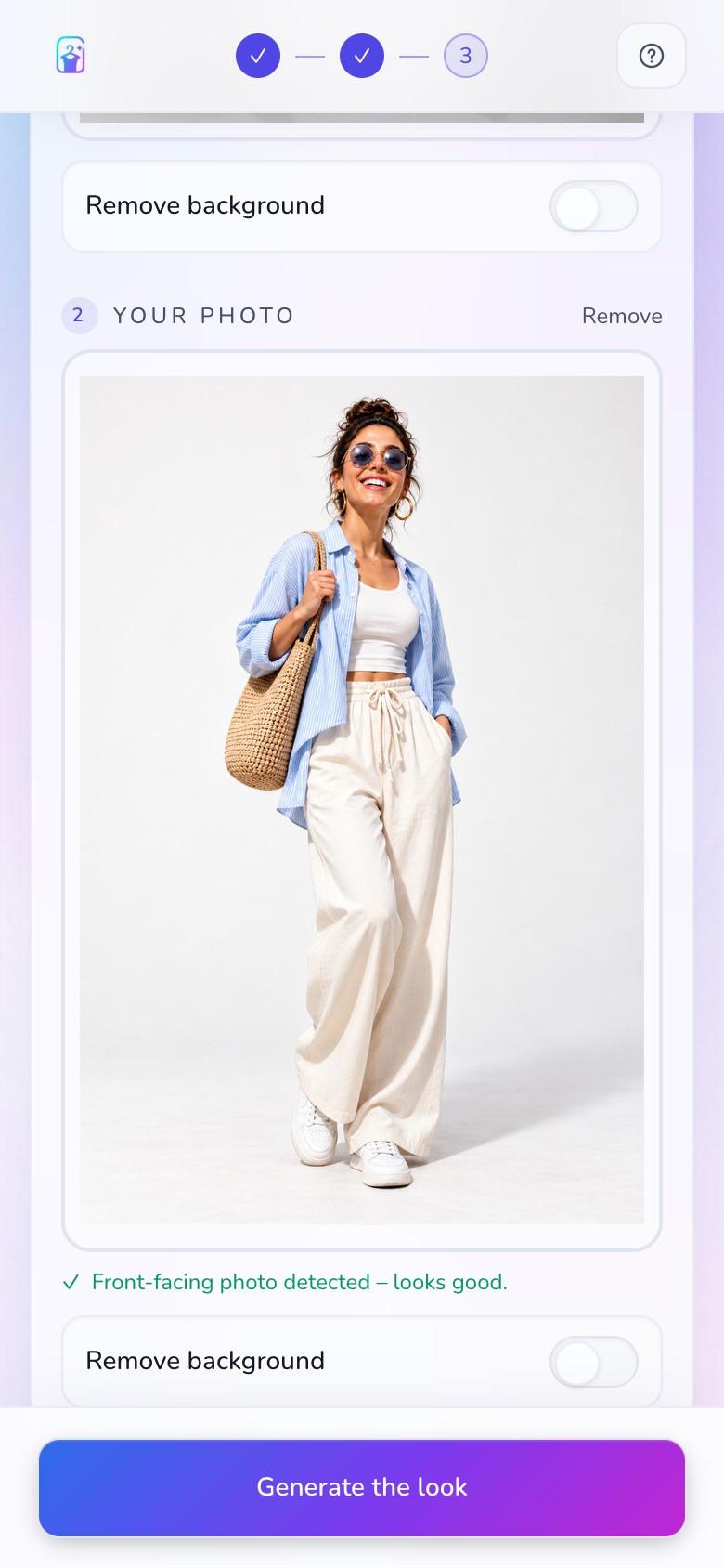 StyleFrame studio on a phone with a smiling shopper in a blue overshirt, white top and cream trousers added as a front-facing photo